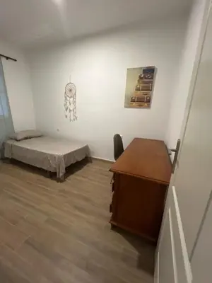 Cama o camas de una habitación en Alojamiento en Murchante