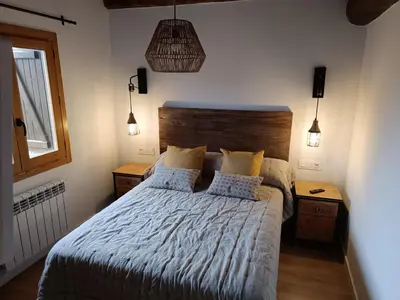 Cama o camas de una habitación en Casa Rural Fort de Bernat