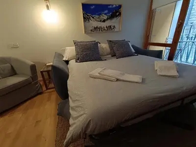 Cama o camas de una habitación en Inmocyma Tu Refugio en Benasque