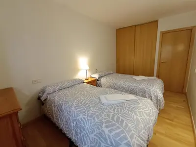 Cama o camas de una habitación en Inmocyma Tu Refugio en Benasque