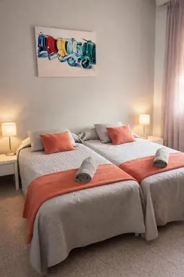 Cama o camas de una habitación en Apartamentos Manu