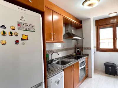 Una cocina o zona de cocina en Dúplex el Torrent - L'Amfitriona