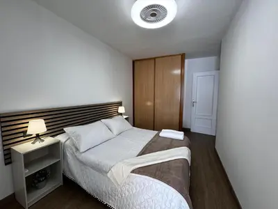 Cama o camas de una habitación en El pilar a 7 minutos