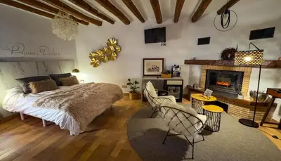 Cama o camas de una habitación en Hotel Rural Flor de Almendro