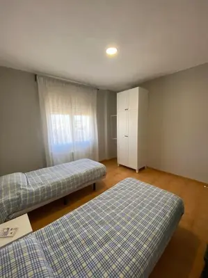 Cama o camas de una habitación en Apartamento ideal para familias