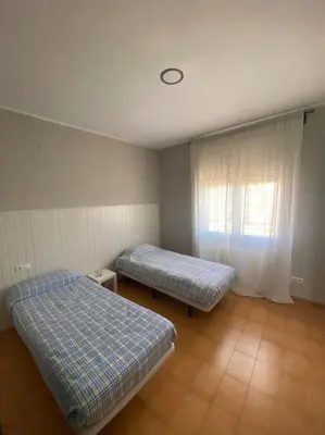 Cama o camas de una habitación en Apartamento ideal para familias
