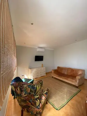 Una televisión o centro de entretenimiento en Apartamento ideal para familias