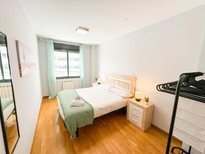 Cama o camas de una habitación en Reina del Pilar ComoTuCasa