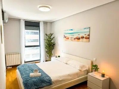 Cama o camas de una habitación en Reina del Pilar ComoTuCasa