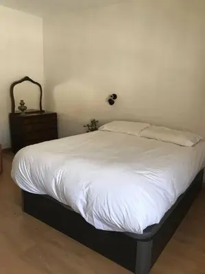 Cama o camas de una habitación en Planta superior en casa de pueblo