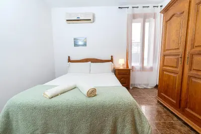 Cama o camas de una habitación en Lo Jardí de Benifallet