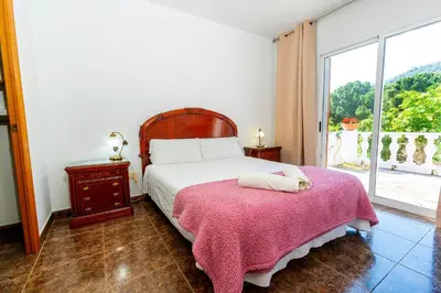 Cama o camas de una habitación en Lo Jardí de Benifallet