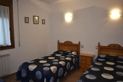 Cama o camas de una habitación en Apartamentos Casa Esperanza - Ordesa