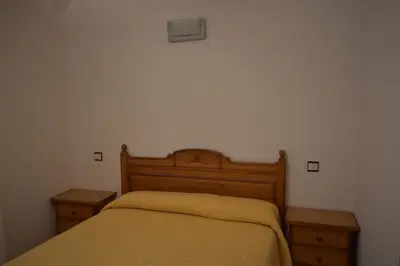Cama o camas de una habitación en Apartamentos Casa Esperanza - Ordesa