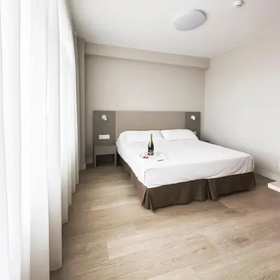 Cama o camas de una habitación en Hotel El Águila