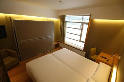 Cama o camas de una habitación en Hotel Continental Balneario de Panticosa