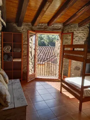 Cama o camas de una habitación en El Refugi