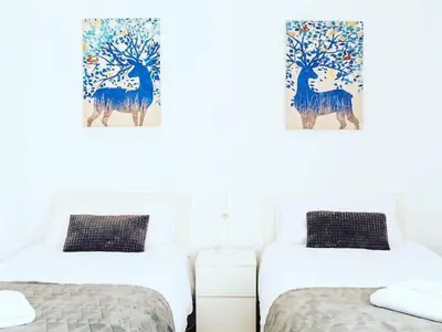 Cama o camas de una habitación en Silencioso muy luminoso y familiar