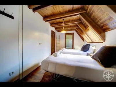 Cama o camas de una habitación en CASA TICOLET de Alma de Nieve