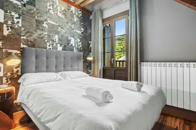 Cama o camas de una habitación en Iraida - Precioso dúplex en Lanuza by Cardi Suites
