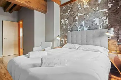 Cama o camas de una habitación en Iraida - Precioso dúplex en Lanuza by Cardi Suites