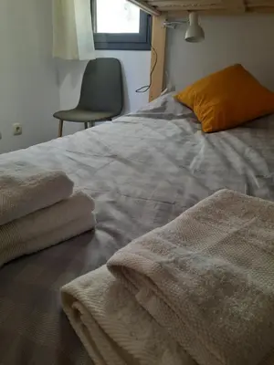 Cama o camas de una habitación en APARTAMENT CASA MONTROIG