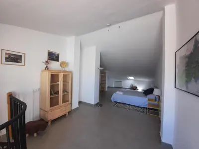 Cama o camas de una habitación en APARTAMENT CASA MONTROIG