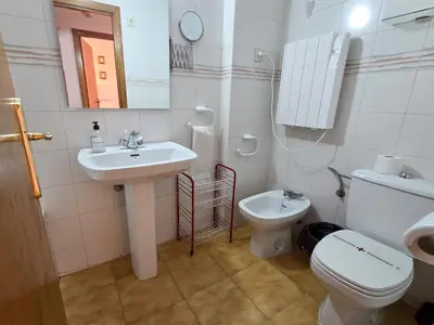 Un baño de Apartamentos Villanua 3000