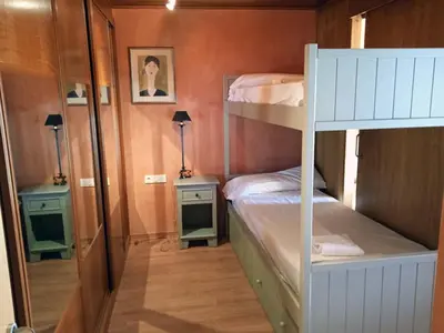 Cama o camas de una habitación en Apartamentos Candanchu 3000