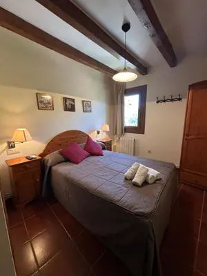 Cama o camas de una habitación en Hostal Centre Del Montsec