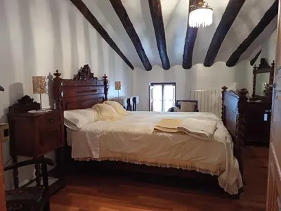 Cama o camas de una habitación en CASA RURAL SANCHO