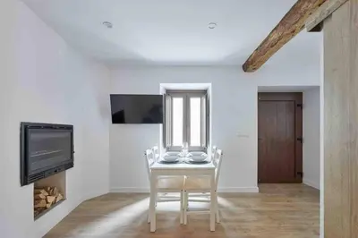 Una televisión o centro de entretenimiento en La casita de Ane - Panticosa