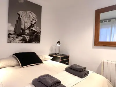Cama o camas de una habitación en Dúplex Can Marc - L'Amfitriona