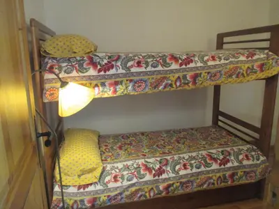 Cama o camas de una habitación en Appartement au Pla de l'Ermita dans la Vallée de BoÏ , Pyrénées Catalanes