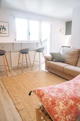 Zona de estar de Apartamento en Formigal luminoso con balcón y vistas
