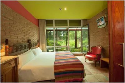 Cama o camas de una habitación en Hotel Ibaiondo