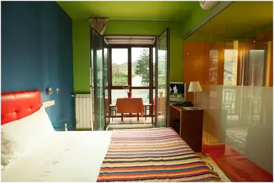 Cama o camas de una habitación en Hotel Ibaiondo