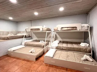 Cama o camas de una habitación en Borda de Paisan - L'Amfitriona