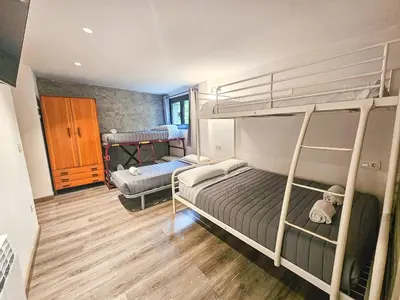 Cama o camas de una habitación en SOLOPUENT Hotel Rural