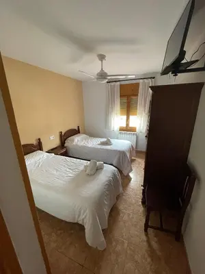 Cama o camas de una habitación en Hostal La Rurala Estopanyà