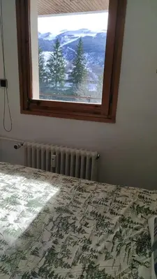 Cama o camas de una habitación en precioso Apartamento con vistas al pico Cerler