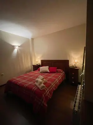 Cama o camas de una habitación en APARTAMENT ESTERRI D'ÀNEU - EDIFICI MONTARDO