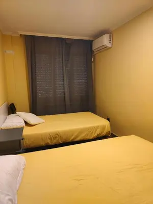 Cama o camas de una habitación en Nuria's home