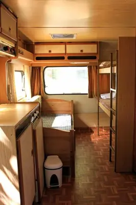 Cama o camas de una habitación en Camping Pirineos Cien Lagos