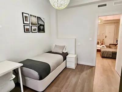 Cama o camas de una habitación en La Esquina de Saraqusta by Alogest
