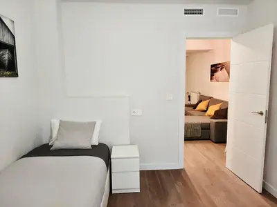 Cama o camas de una habitación en La Esquina de Saraqusta by Alogest
