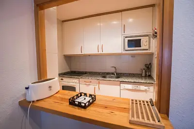 Una cocina o zona de cocina en Baqueira 1500 a pie de pistas