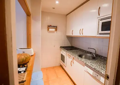 Una cocina o zona de cocina en Baqueira 1500 a pie de pistas