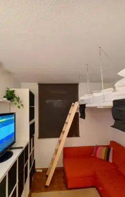 Una televisión o centro de entretenimiento en Petit Baqueira 1500 a pie de pistas
