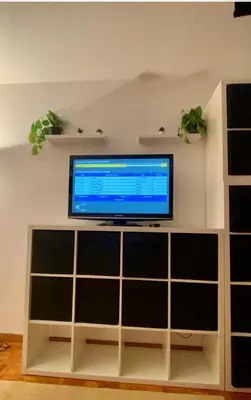 Una televisión o centro de entretenimiento en Petit Baqueira 1500 a pie de pistas